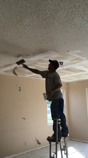 Popcorn removal 2 Popcorn ceiling removal by Bizarro Remodeling.